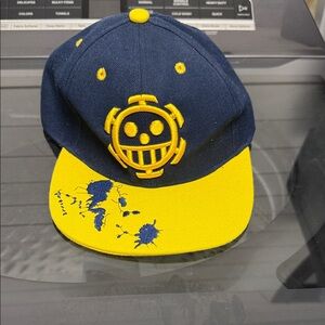 Navy and Yellow Smiley Graphic Cap